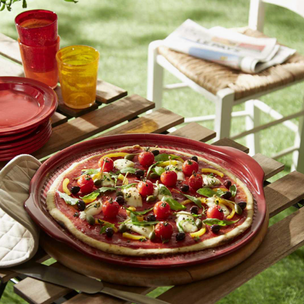 Pierre à pizza rainurée Émile Henry – Rouge – Ø37 cm